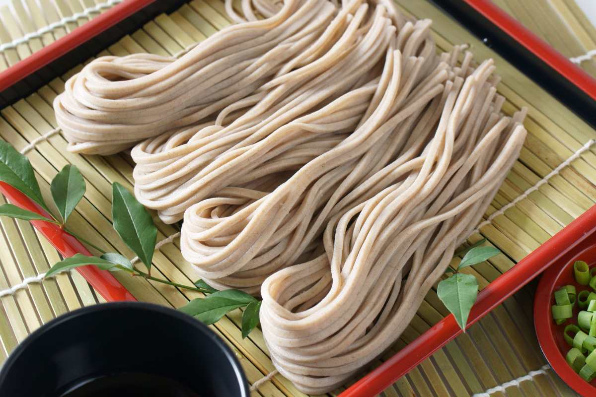Hanks of soba noodles on a serving plate