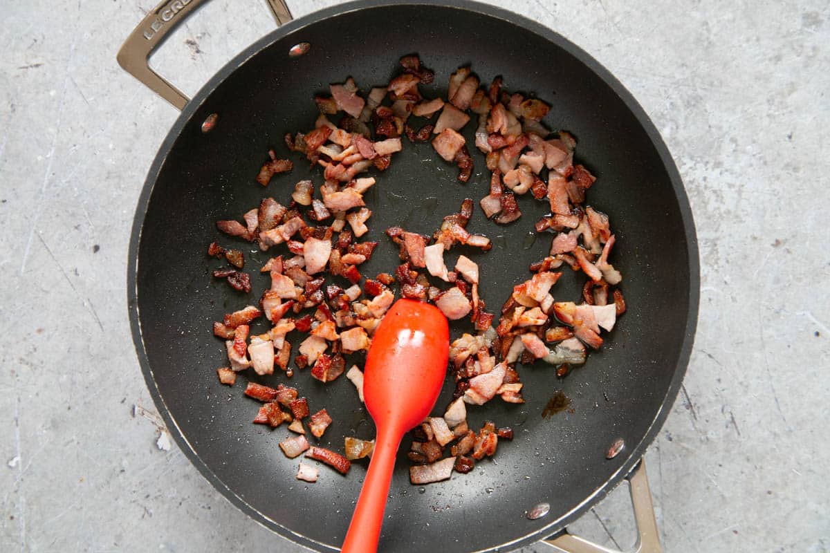 Frying the bacon.
