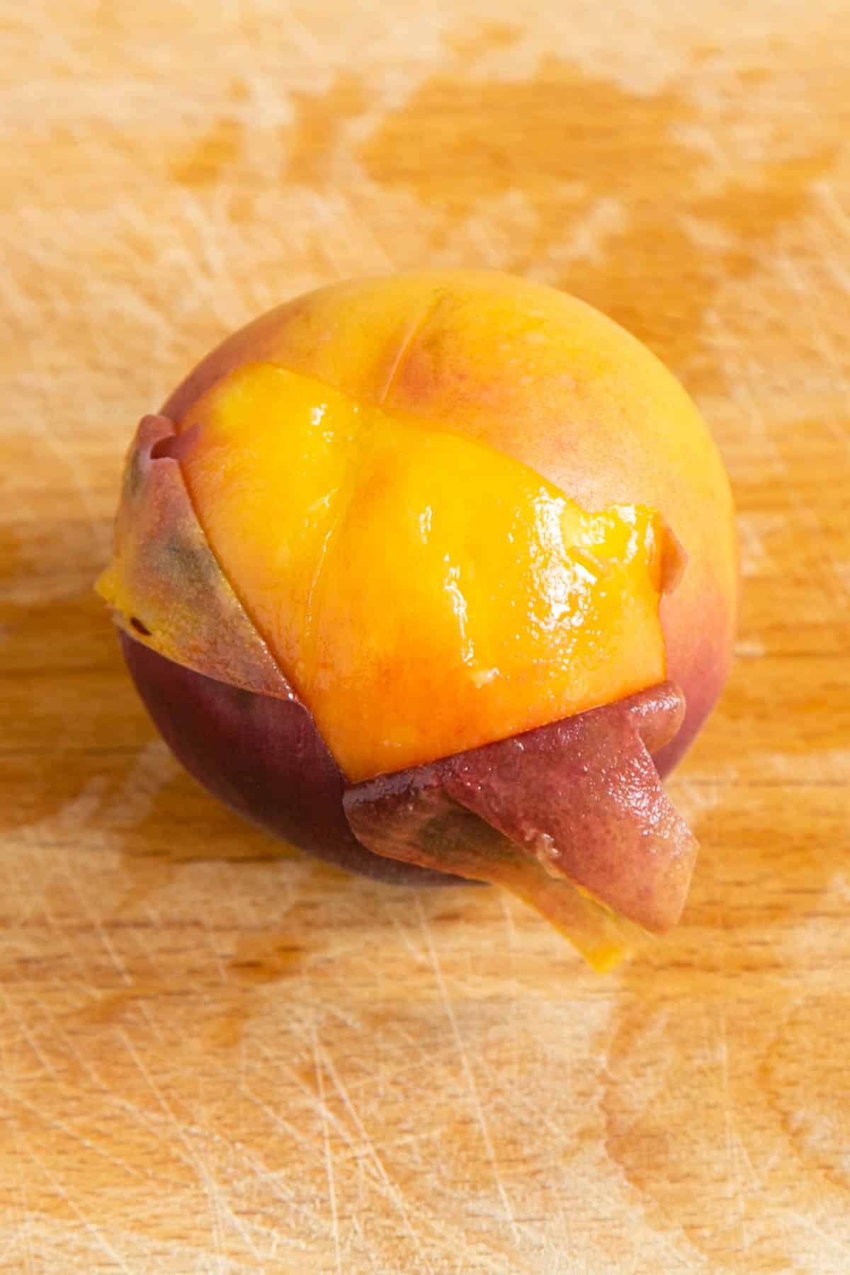 The skin of the blanched peaches peels away easily.