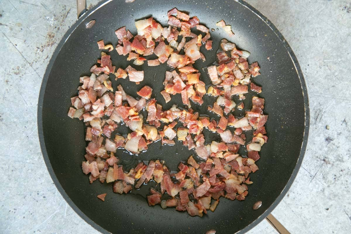 Frying the bacon - when it takes on a golden colour, it is ready.