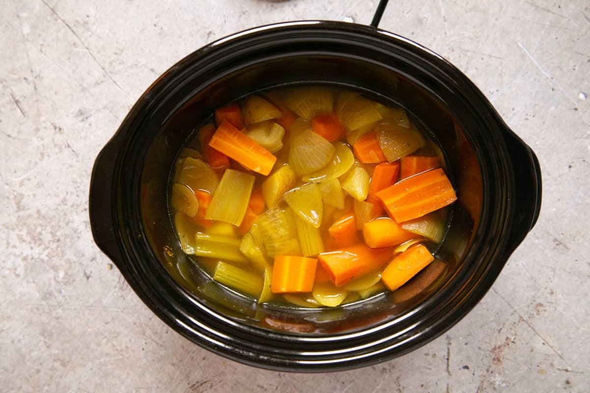 The cooked vegetables in the pot.