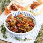 A dainty dish of tomato and bacon jam, garnished with thyme. A littlel goes a long way!