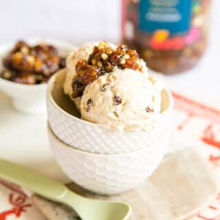 A dainty bowl of mincemeat ice cream, topped with extra mincemeat.