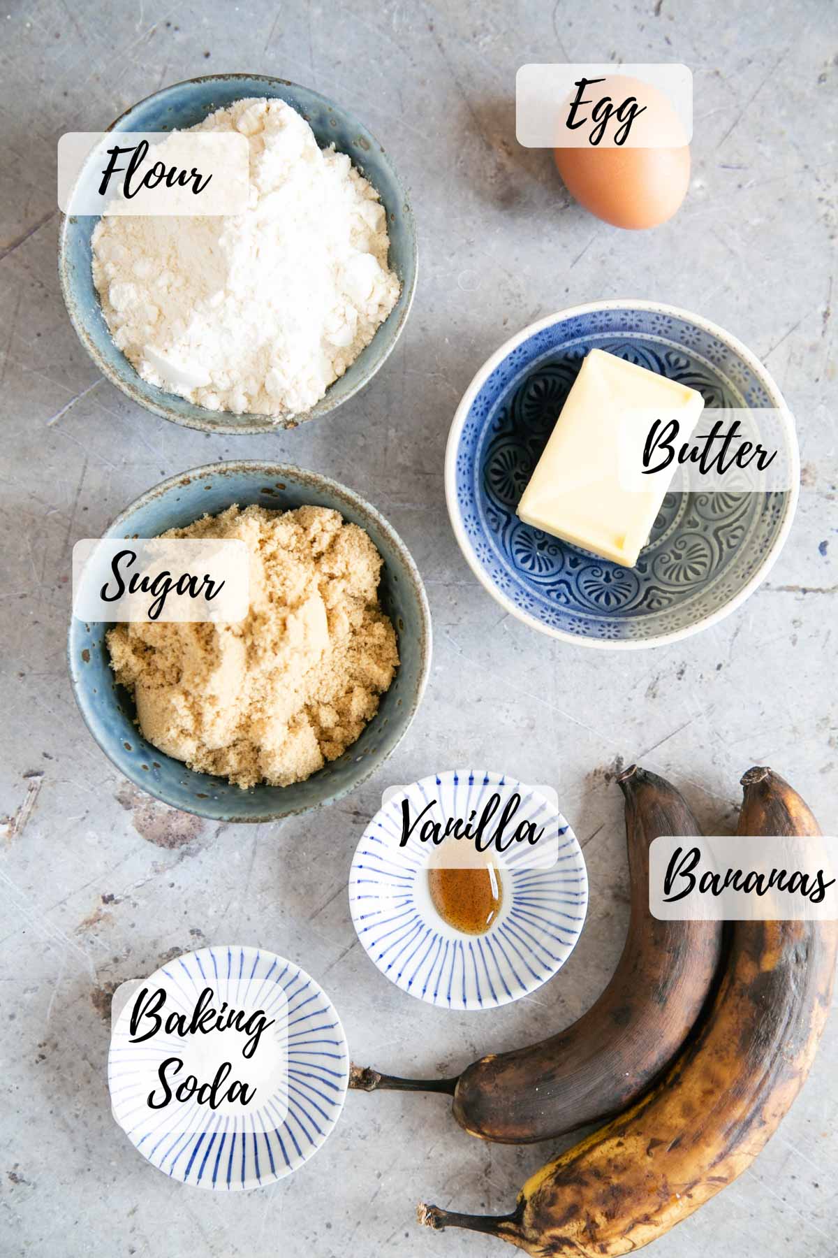 The ingredients: self raising flour, egg, butter, ripe bananas, vanilla, baking soda and sugar.