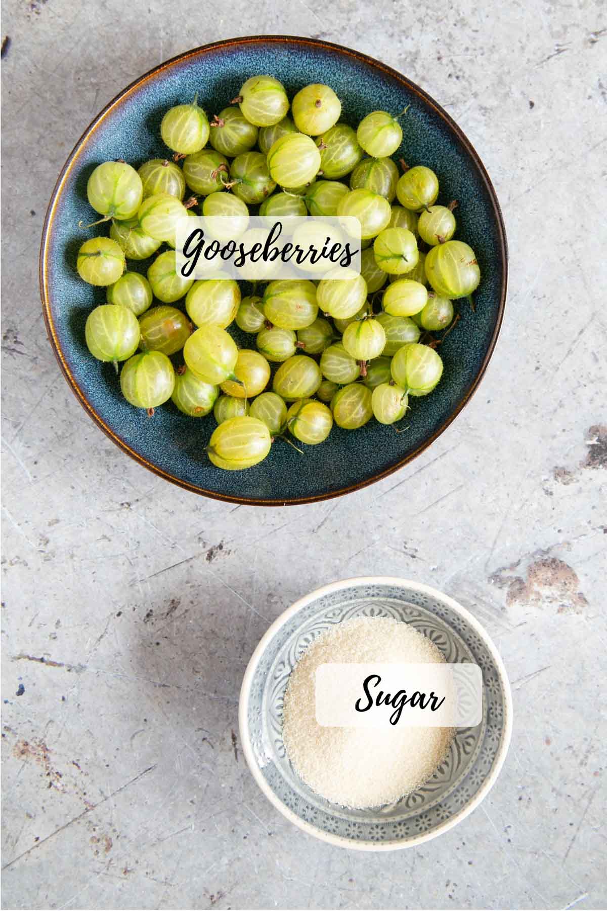The two ingredients for gooseberry compote - fruit and sugar. Just add a small splash of water.