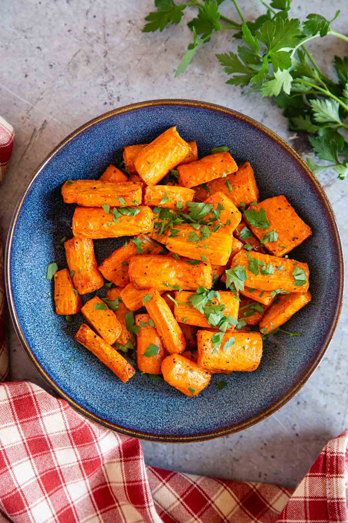 Air fryer carrot brought fresh to the table, hot and golden.