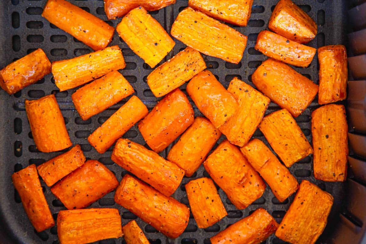 The cooked carrots, golden and caramelized at the edges.