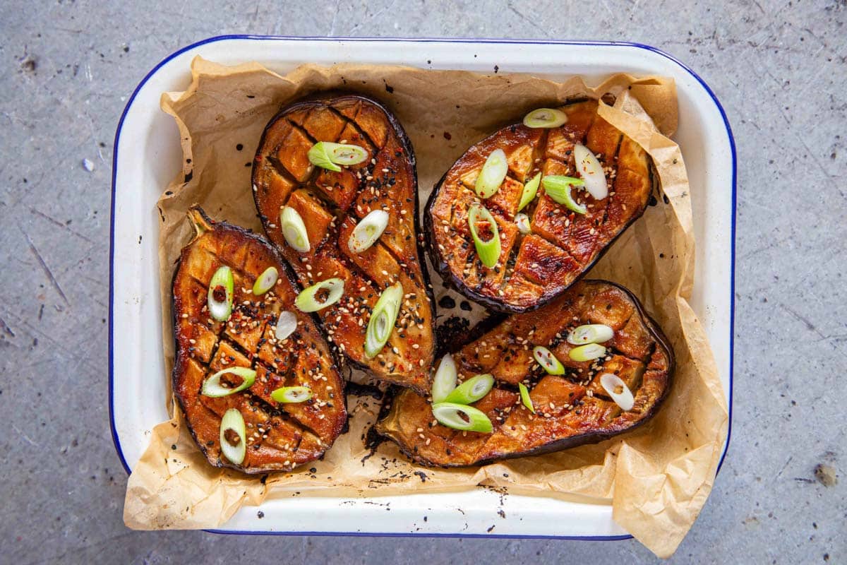 The miso eggplant garnished with red pepper flake, spring onion and sesame seeds.
