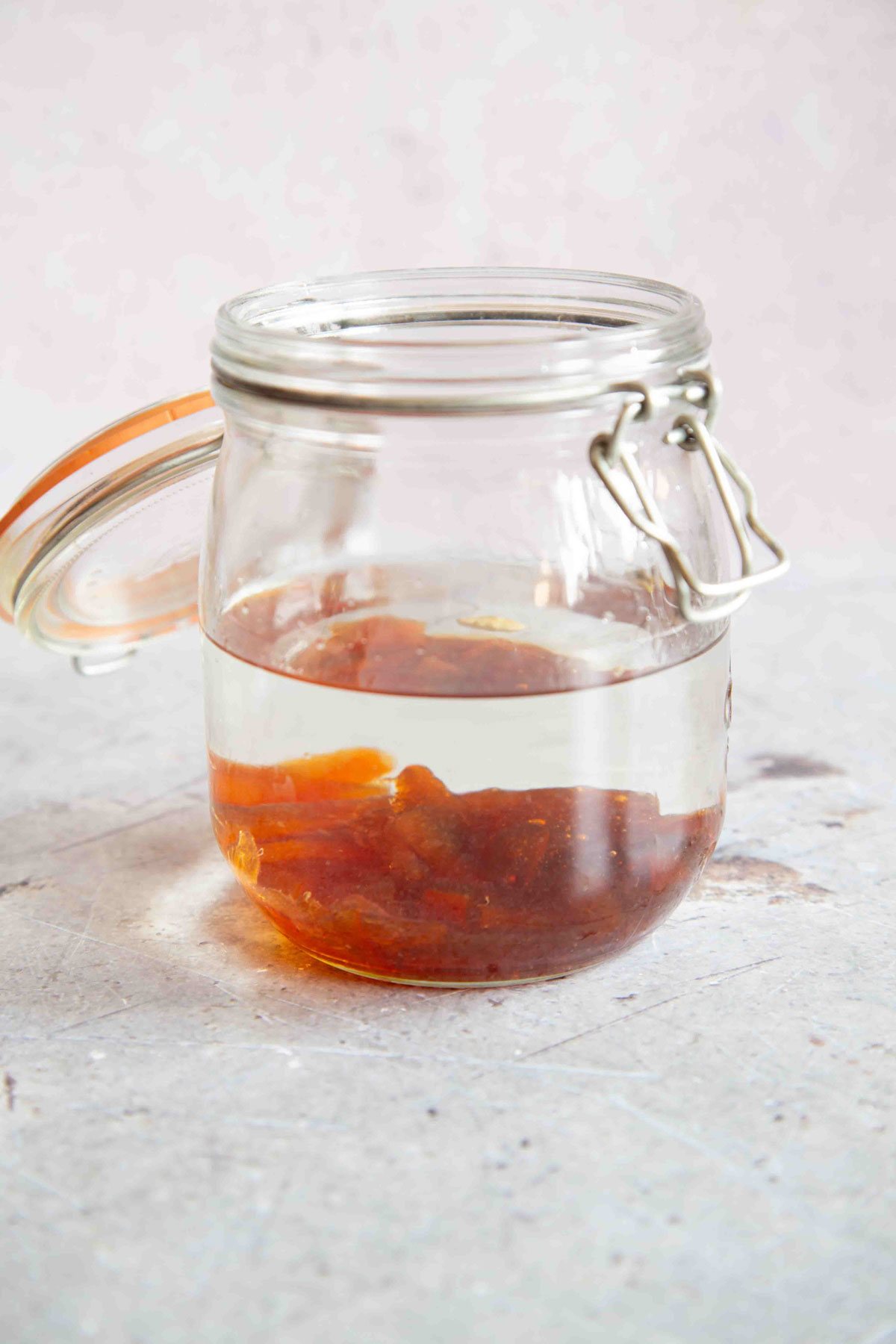 The marmalade, cardamon and vodka in a Kilner jar.