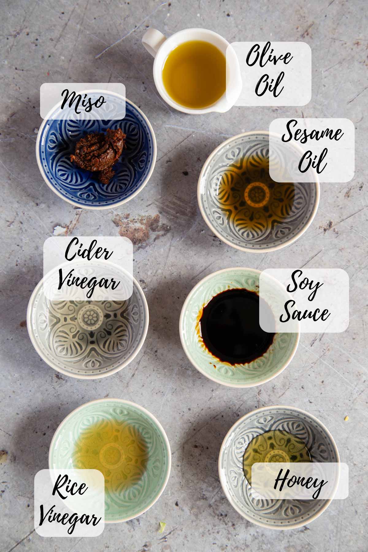 The ingredients: olive oil, sesame oil, soy sauce, honey, rice vinegar, cider vinegar, miso paste