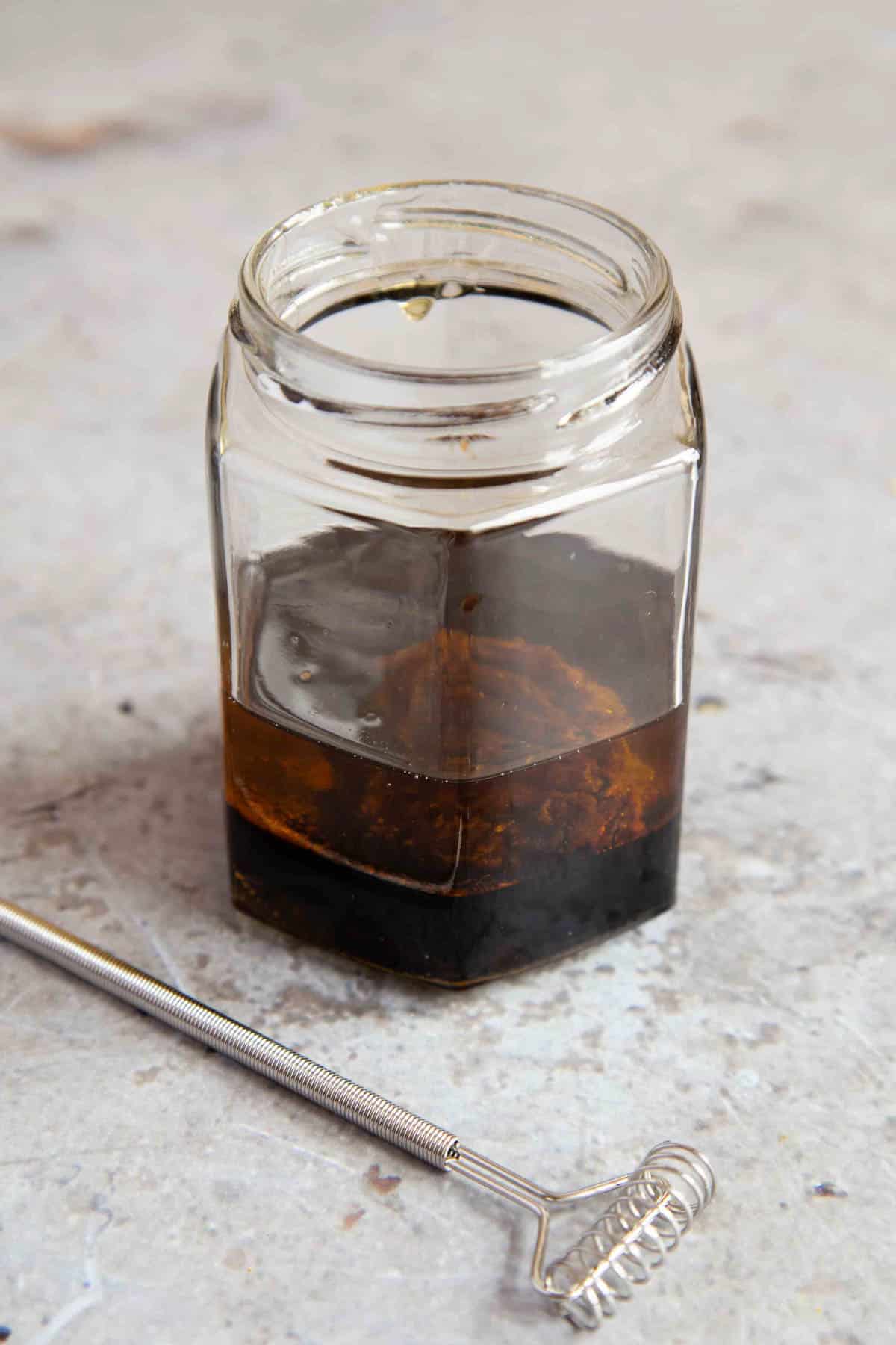 The ingredients in a jar, the oil at the top.