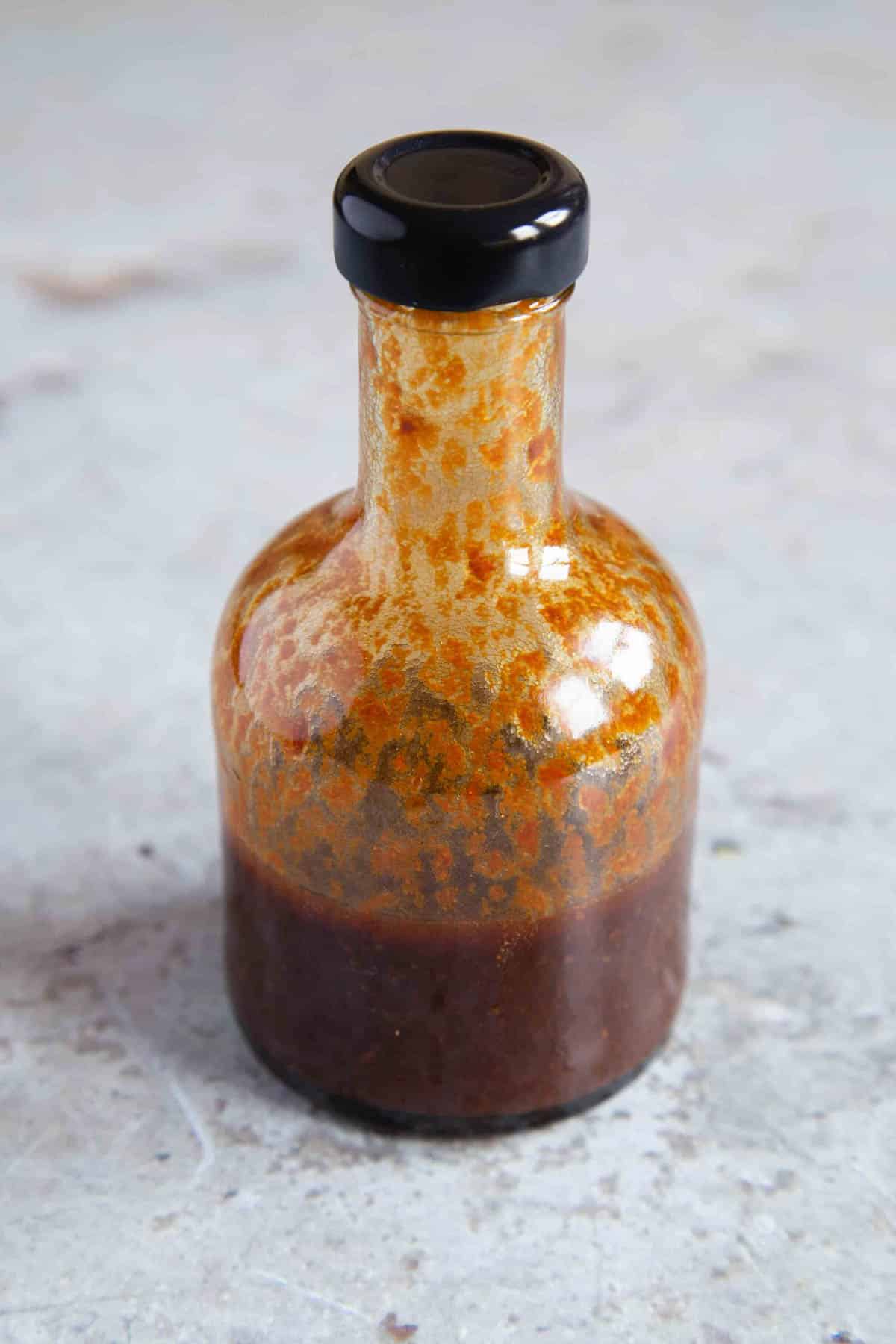 The dressing transferred to a bottle to serve.
