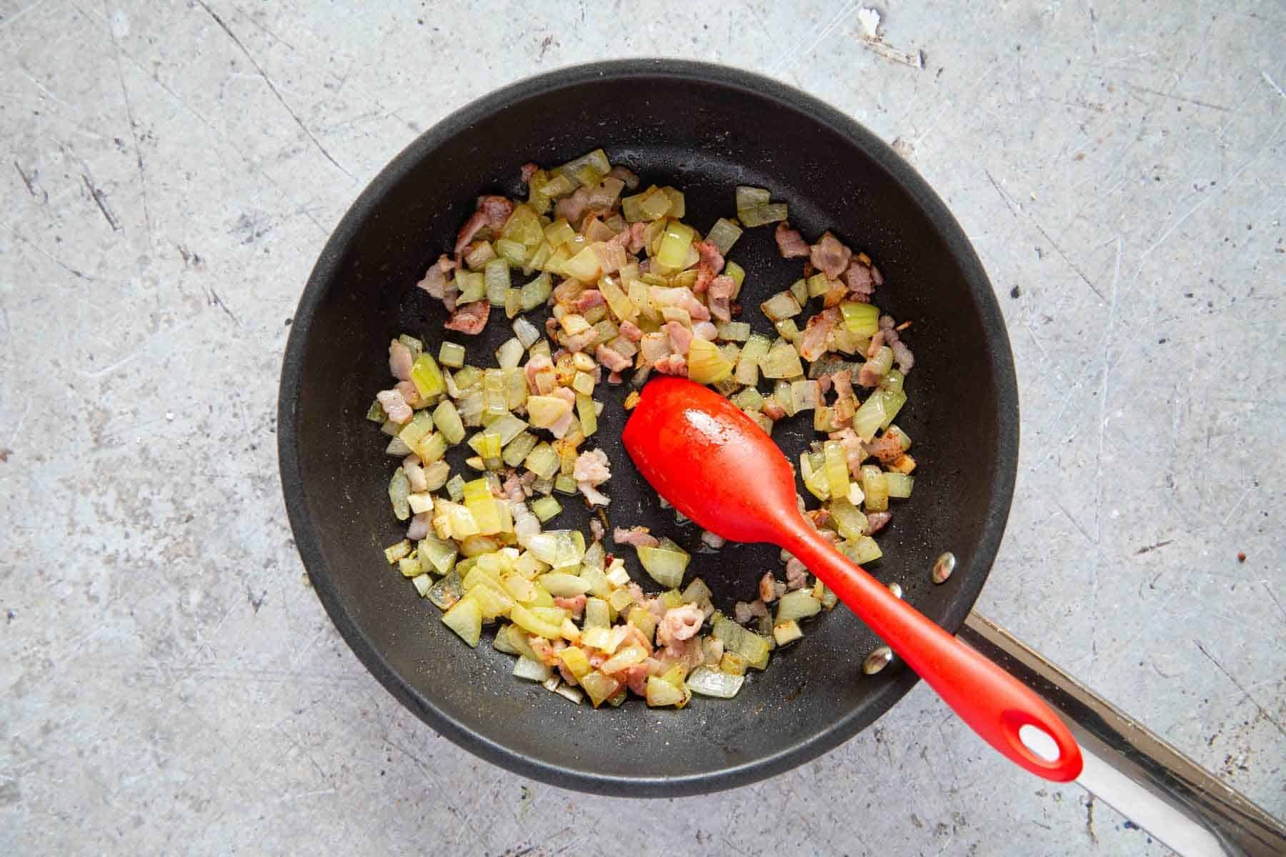 bacon and onions have been friend until they are golden