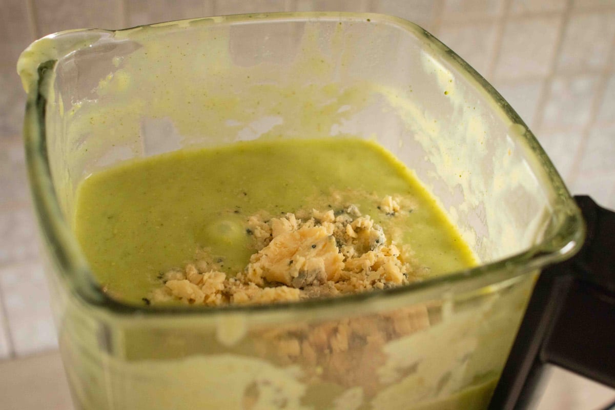 adding the stilton to the hot soup