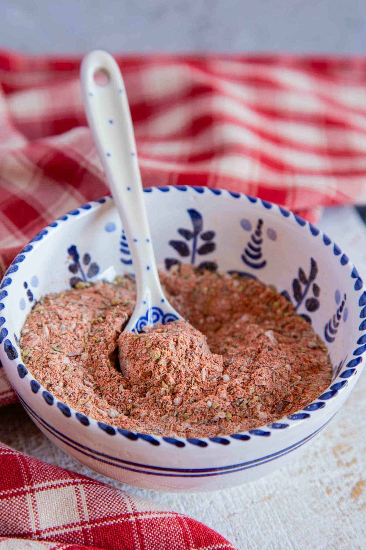 A bowl of chicken seasoning mixture that is ready to use