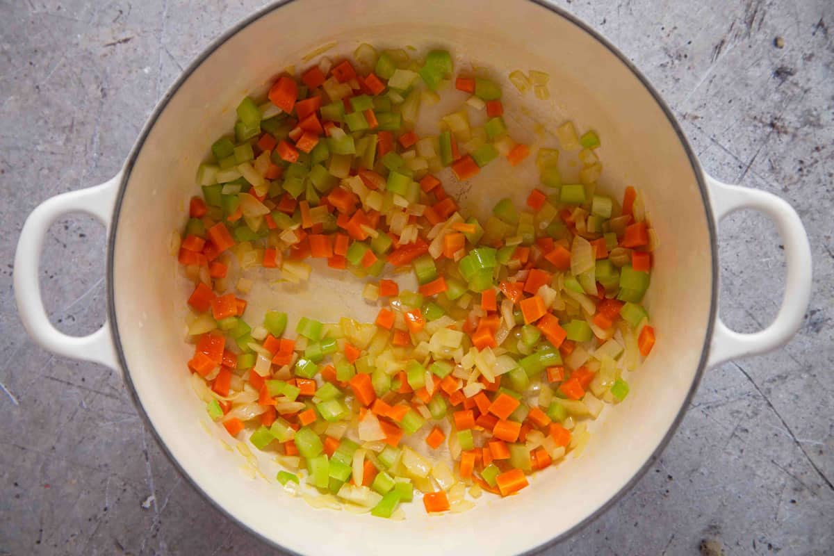 frying the carrot celery and onion in a casserole dish