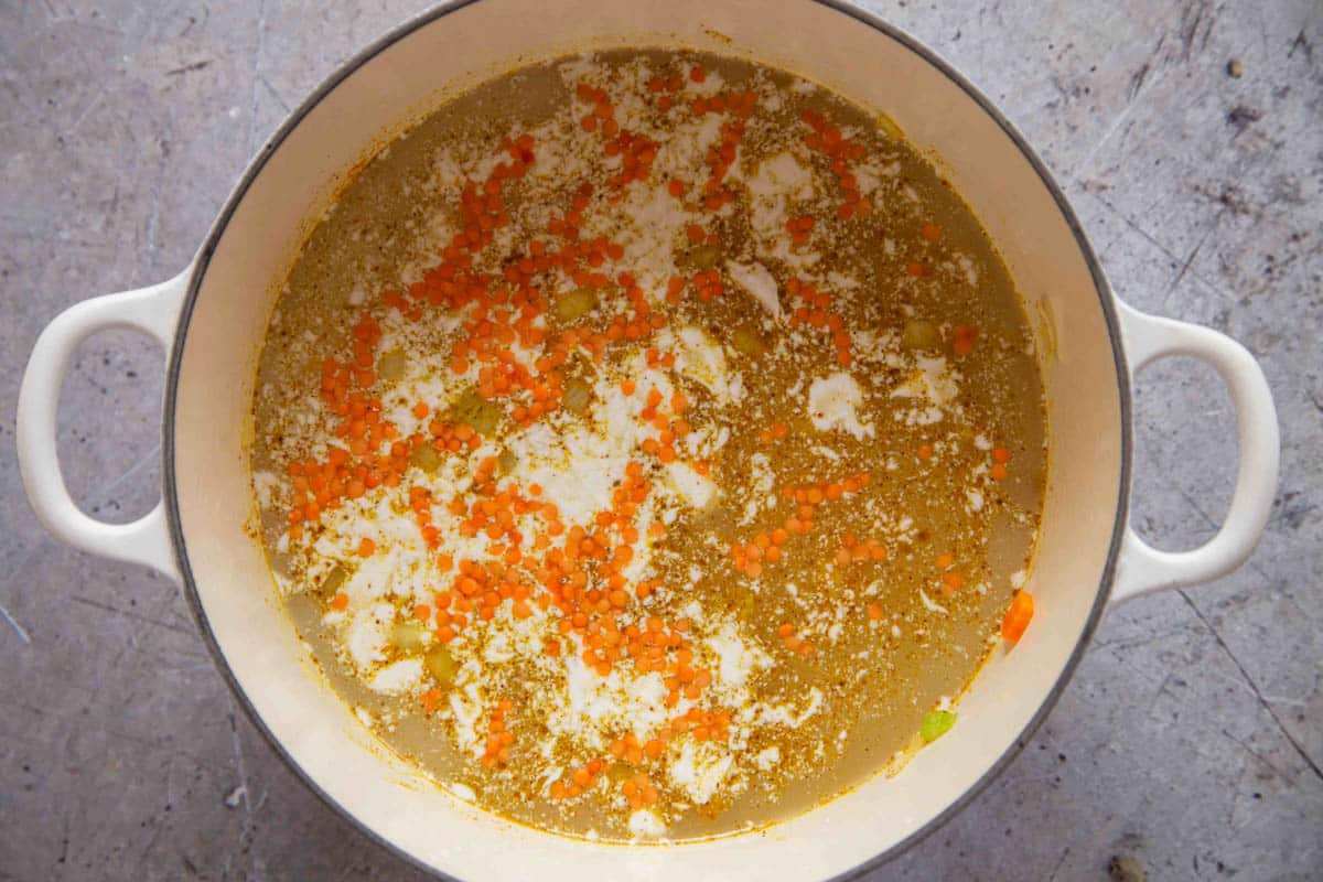 the lentils stock and coconut milk is added