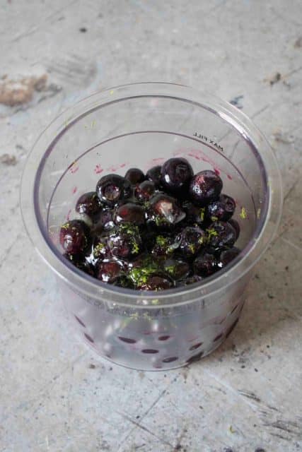 Blueberries honey and lime zest and juice in the pot