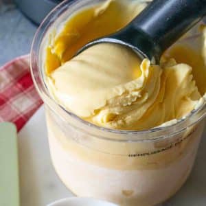 A close up of smooth and delicious pale yellow mango ice cream