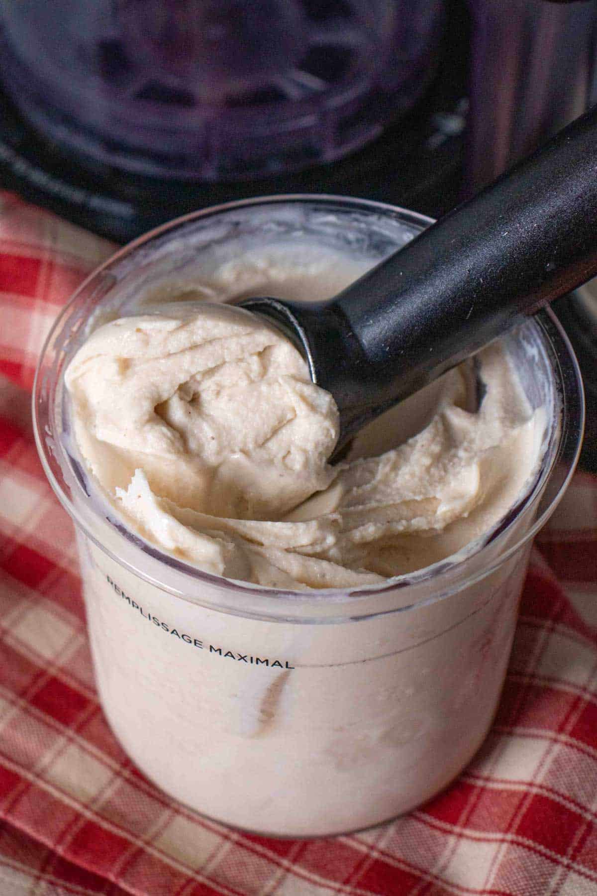 Ninja creami banana froyo being scooped from the pot