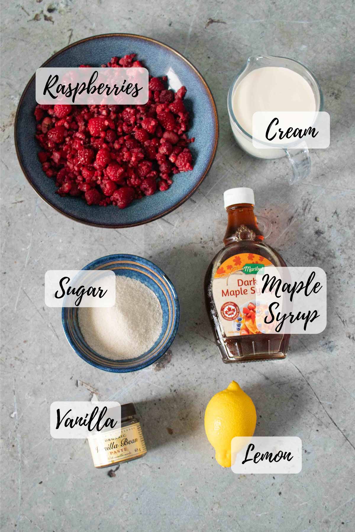 Ingredients are raspberries cream sugar maple syrup vanilla extract paste and a lemon