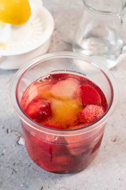 All ingredients of strawberry sorbet have been added to the pot