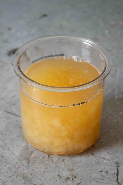 Water is added to the ingredient up to the max fill line and everything is stirred together well.