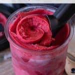 Blackberry and apple sorbet being scooped out of the Ninja Creami pot