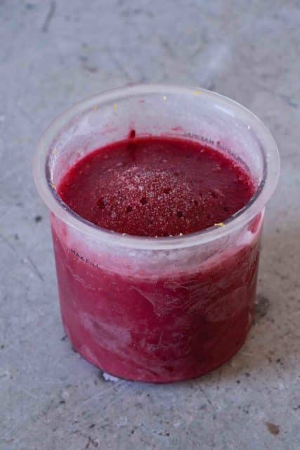 The pot full of sorbet mixture has frozen and is ready to be spun