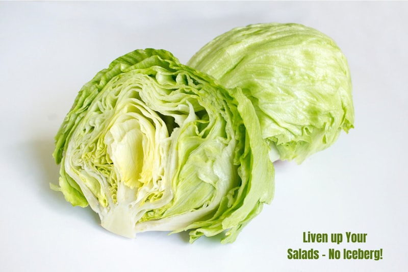 a pale green iceberg lettuce cut in half