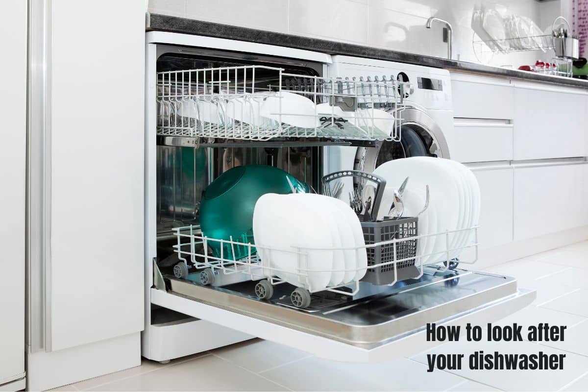 A dishwasher full of clean cutlery and crockery, after a washing cycle.