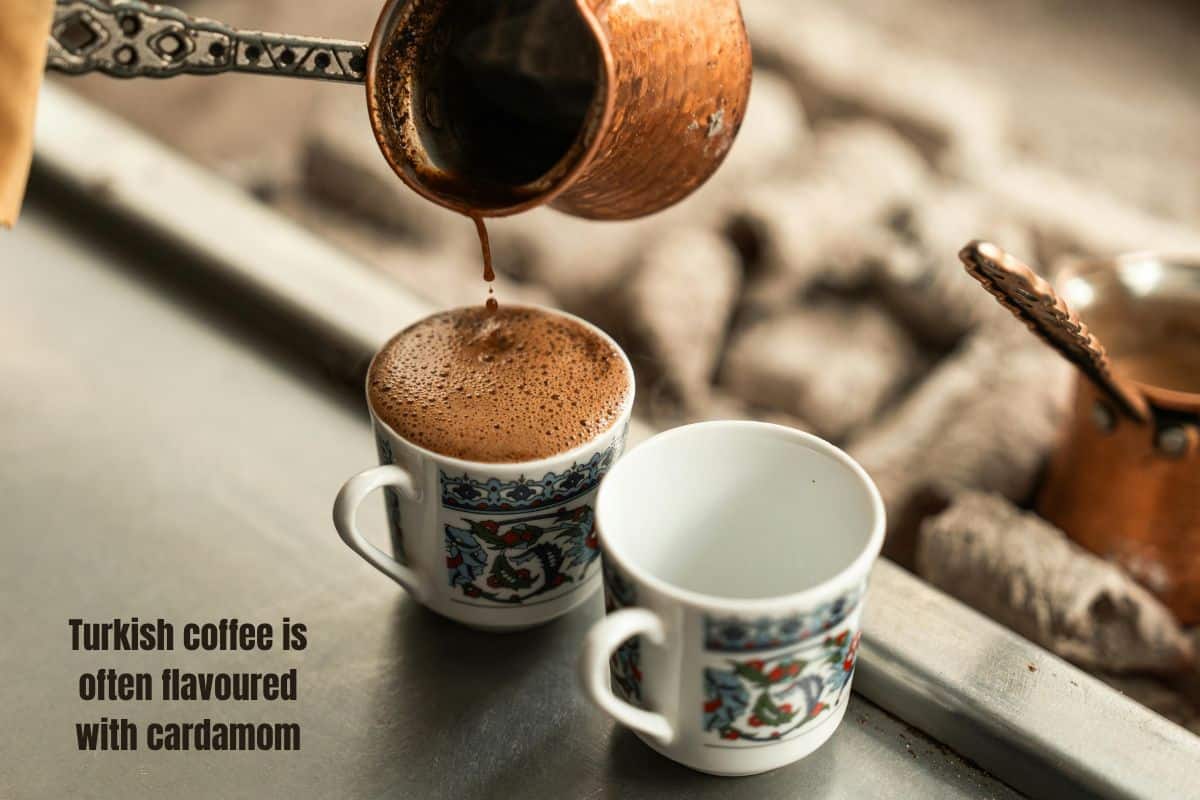 pouring hot turkish coffee into small mugs